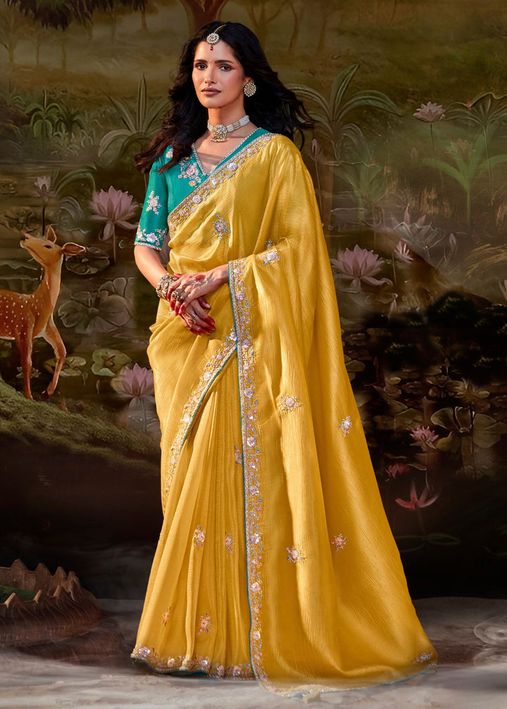Torquise And Mustard Saree With Embroidery And Handwork Designer Cut Border