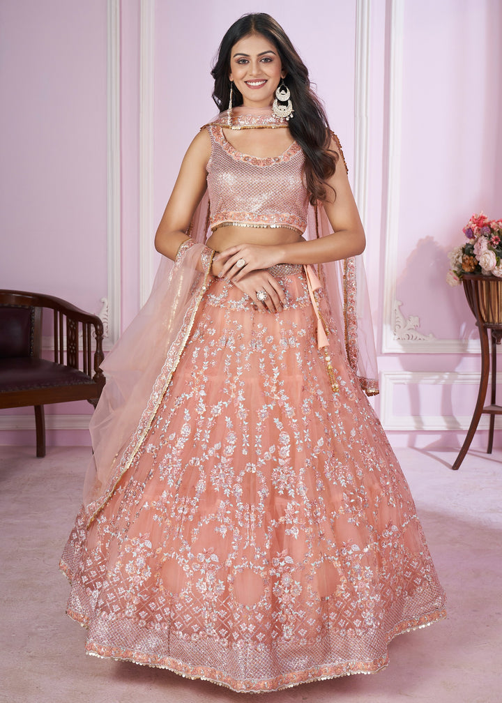Peach Pink Net Lehenga Choli With Sequins And Thread Embroidery Work