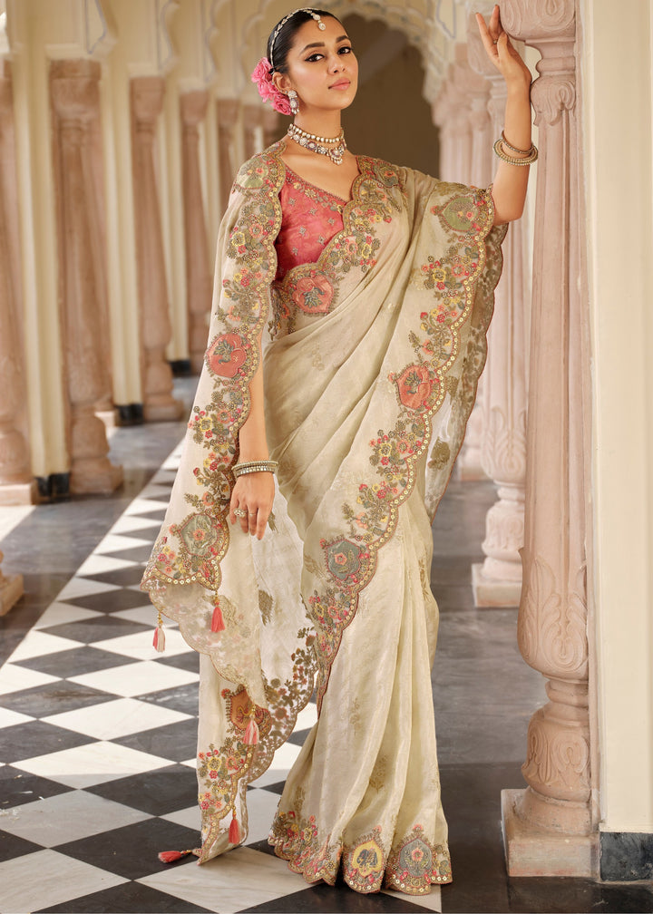 Pastel Cream with Peach-Pink floral border Silk Saree