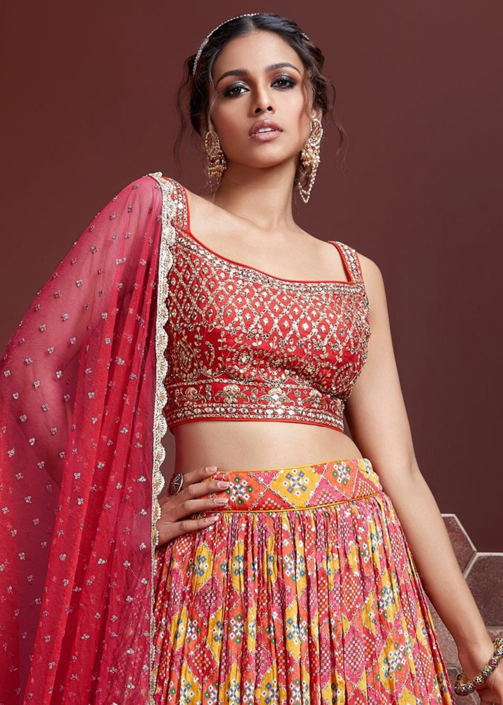 Red & Orange Bandhani Printed Chinon Silk Lehenga Choli with Embroidery & Mirror work