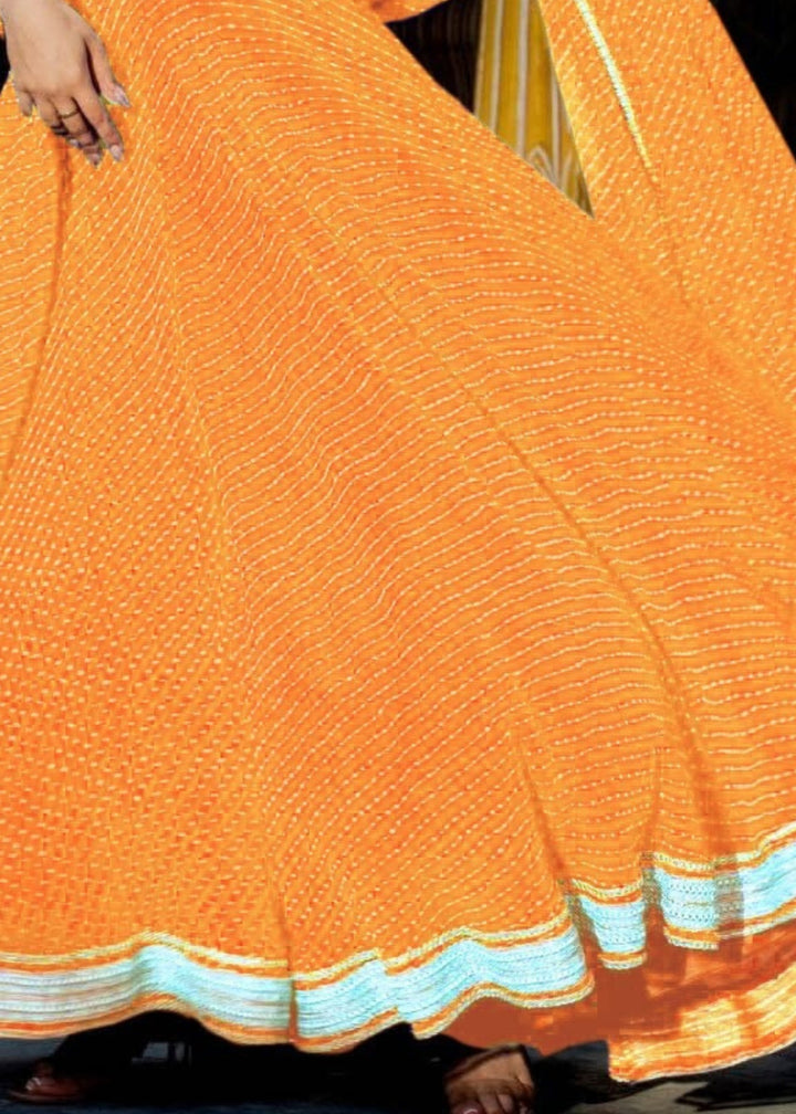 Tang Orange Georgette Leheriya Print Lehenga With Zari And Lace Work