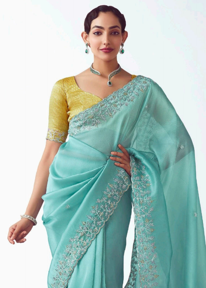 Sky Blue Fancy Fabric Silk Saree With Hand Embroidered Work And Cut Work Border