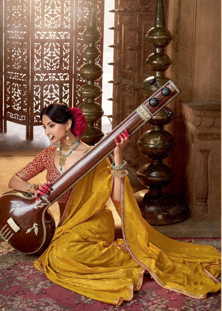 Yellow Pure Viscous Crepe based fabric with Hand dying & Butti weaving Saree