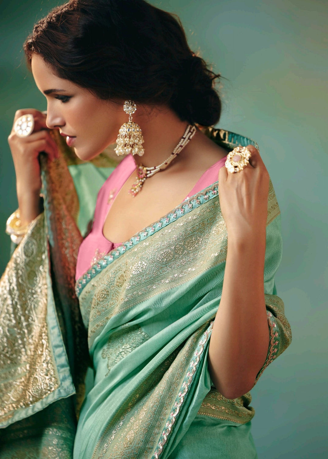 Sea Green Pure Viscose Dola Silk Saree with Zari Weaving & Embroidered Blouse