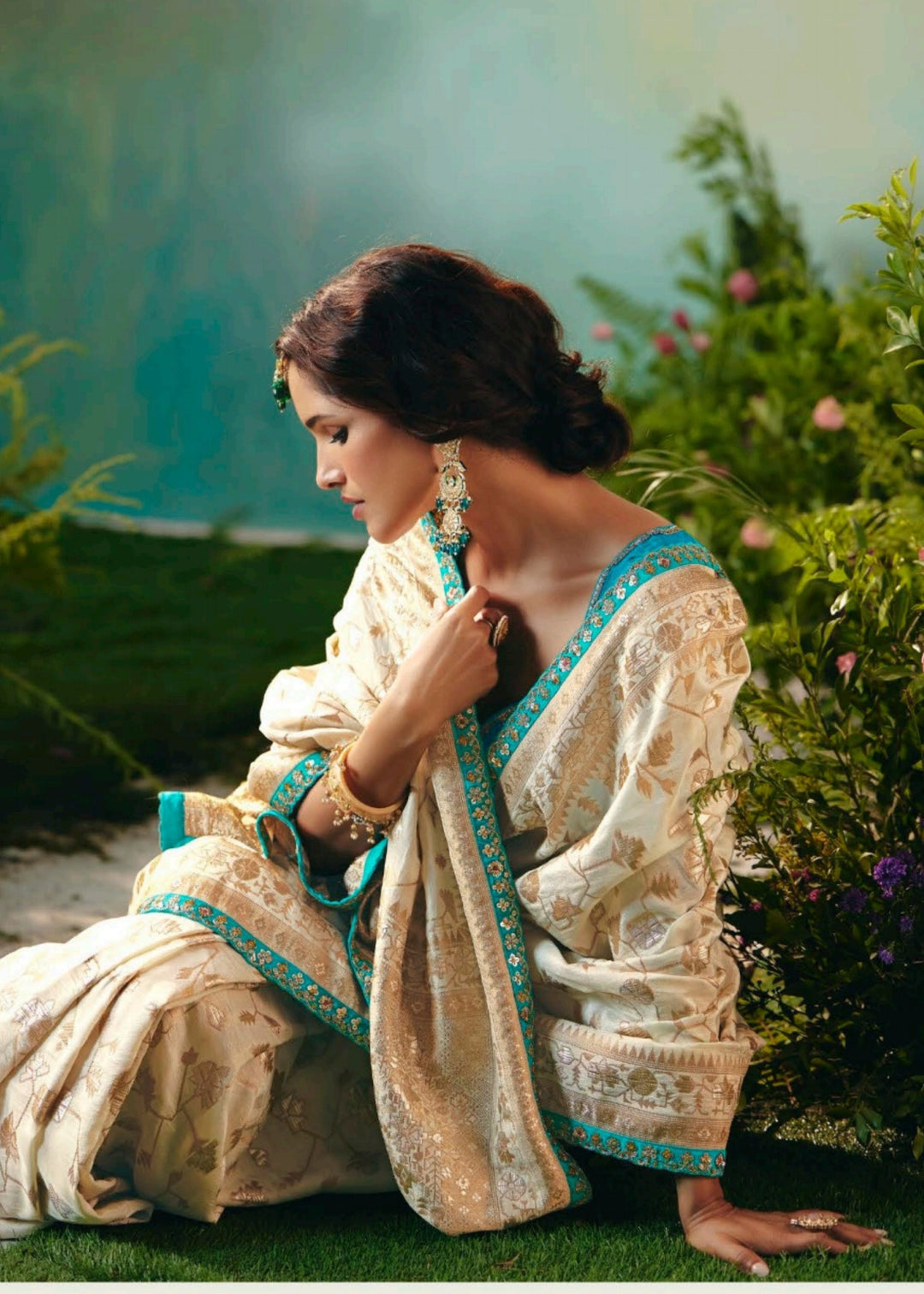 Off-White Pure Viscose Dola Silk Saree with Zari Weaving & Embroidered Blouse