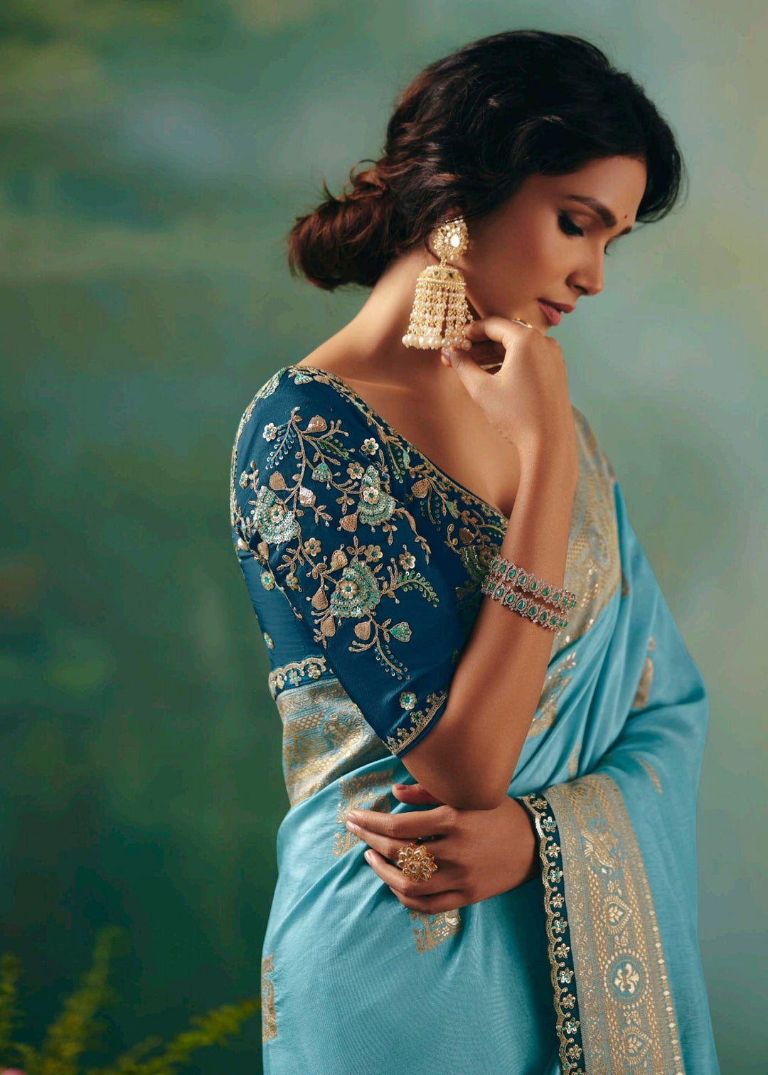 Sky Blue Pure Viscose Dola Silk Saree with Zari Weaving & Embroidered Blouse