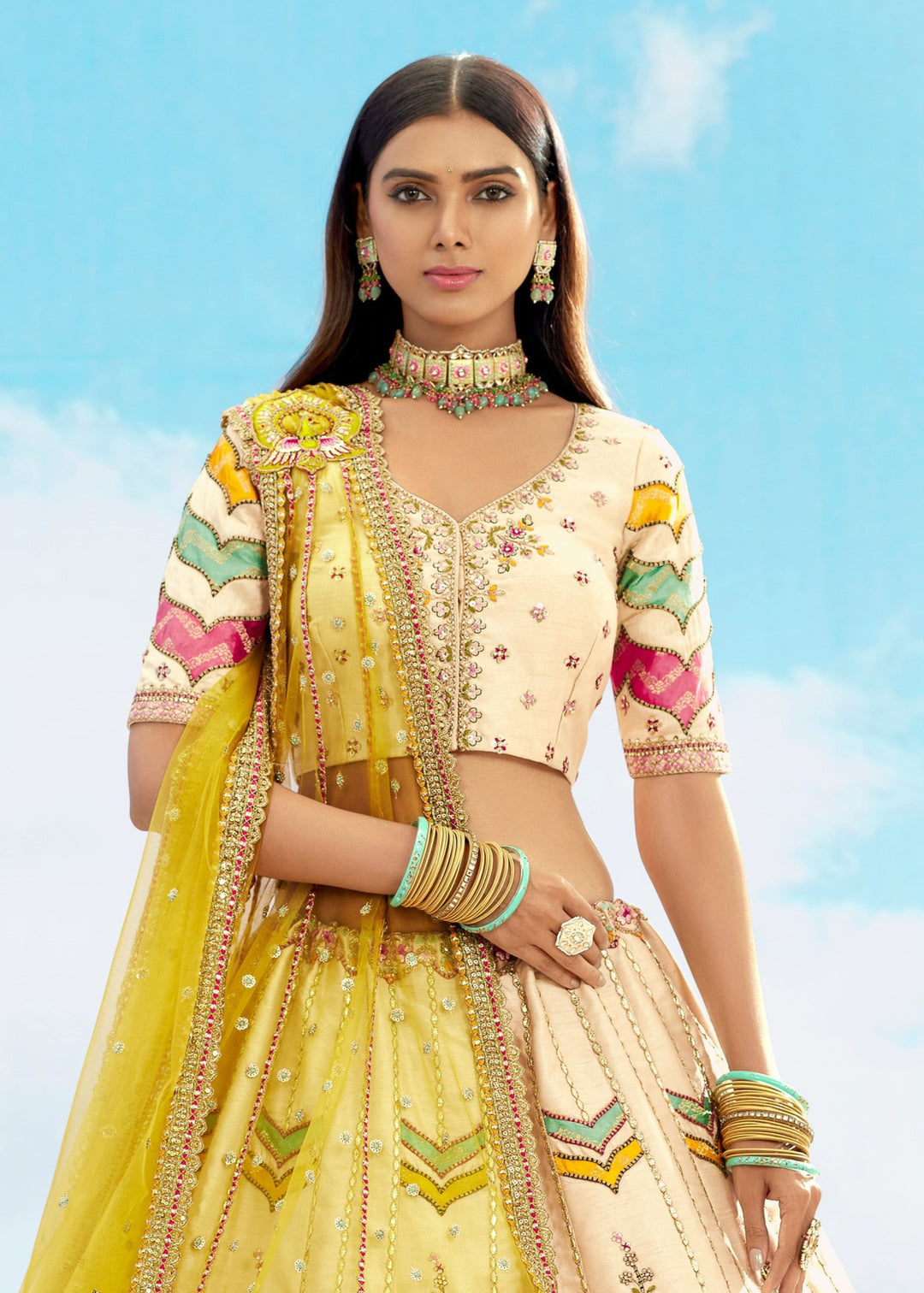 Off-White And Yellow Silk Lehenga With Cut Work Border