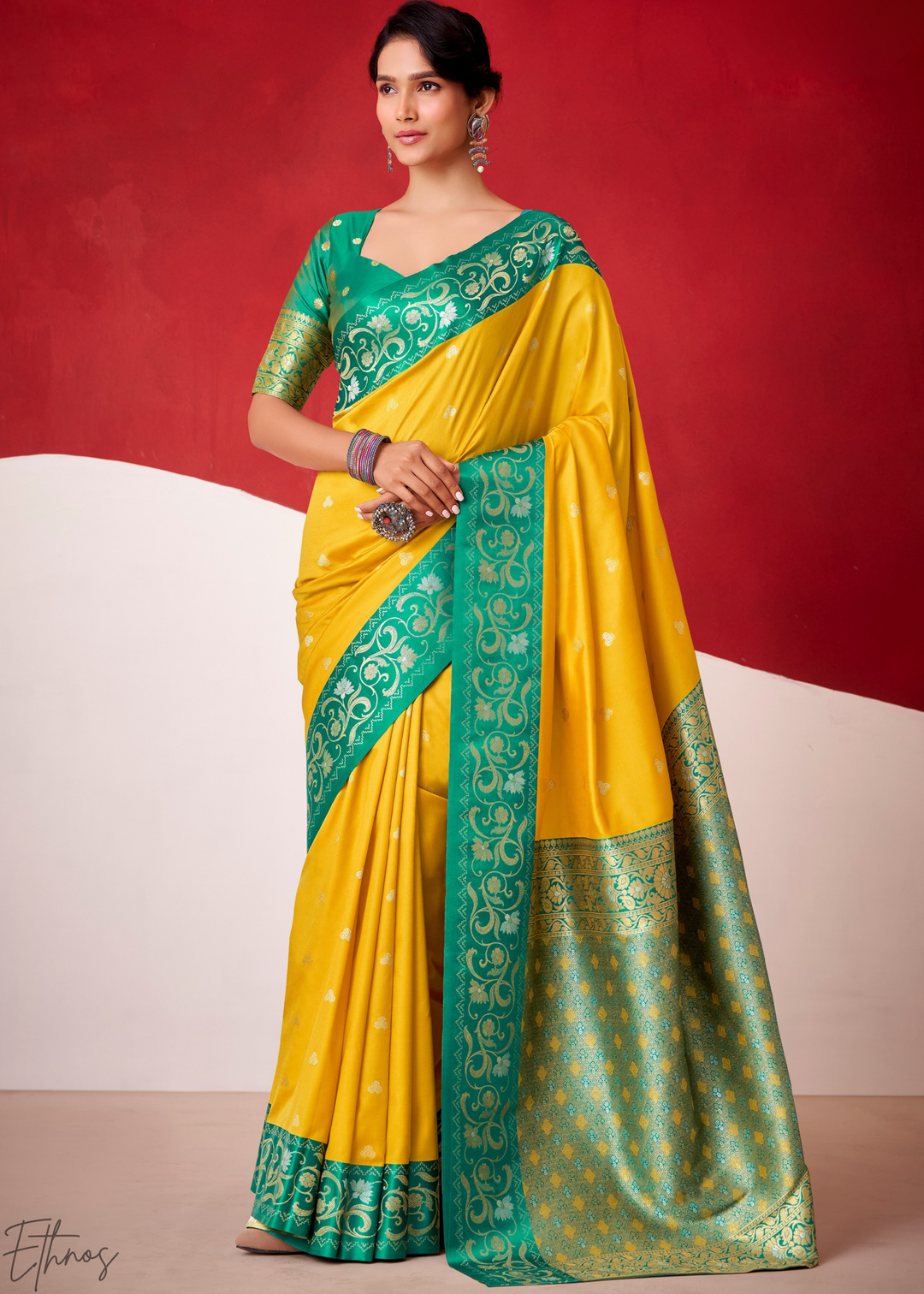Saffron Yellow Paisley Border Satin Silk Saree