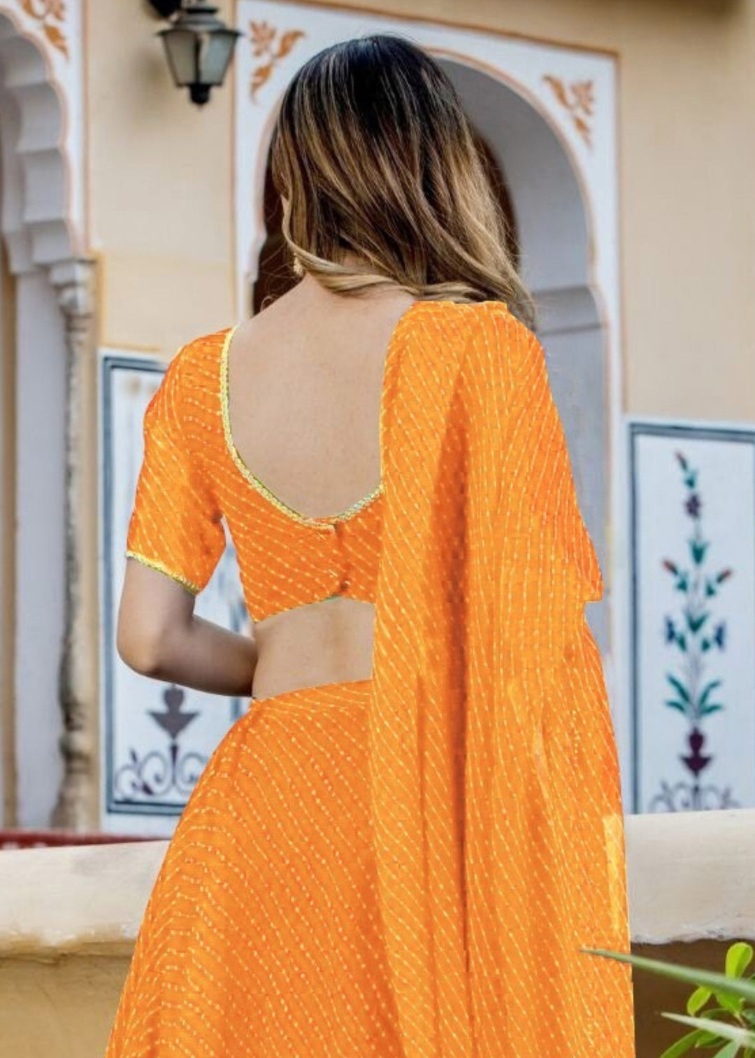 Tang Orange Georgette Leheriya Print Lehenga With Zari And Lace Work