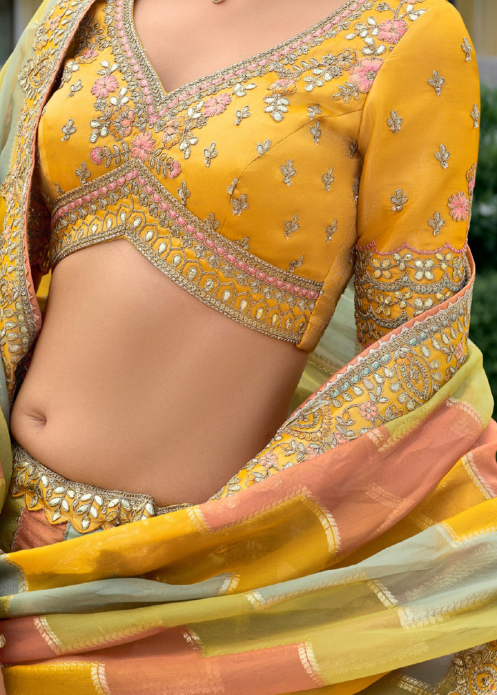 Sage Green And Mustard Silk Lehenga With Cut Work Border And Embroidery