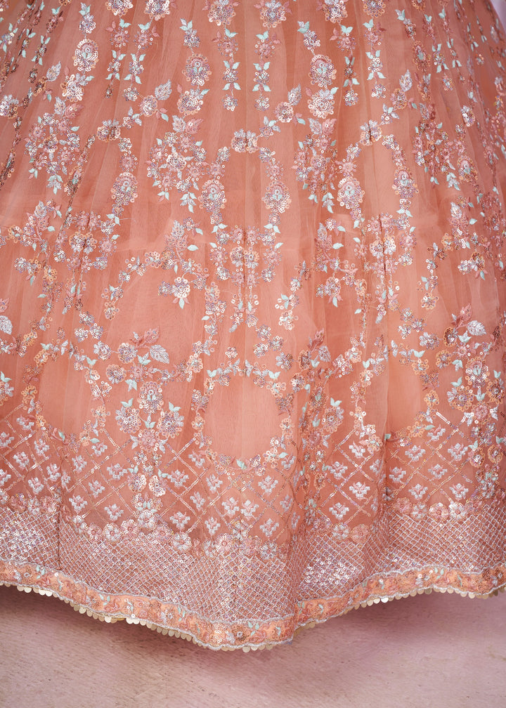 Peach Pink Net Lehenga Choli With Sequins And Thread Embroidery Work