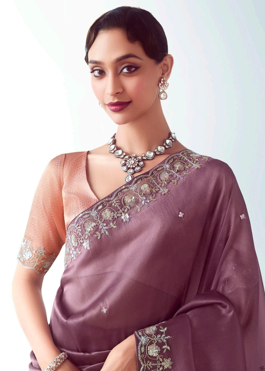 Tacao Purple Fancy Fabric Silk Saree With Hand Embroidered Work And Cut Work Border