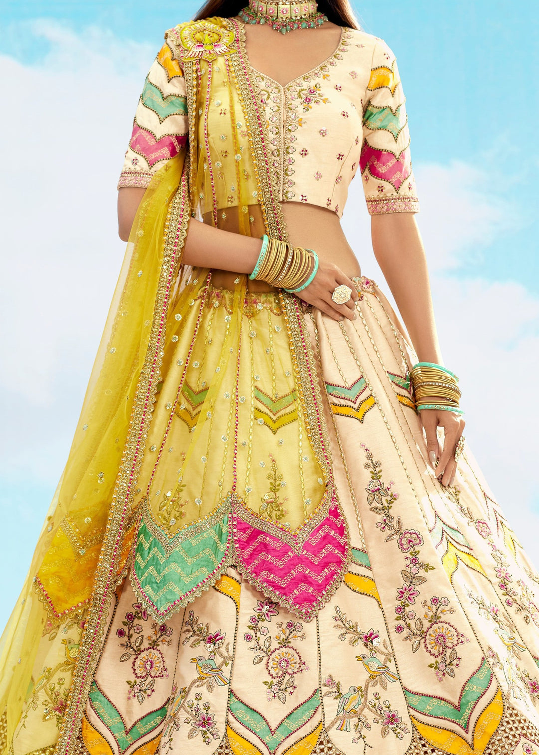 Off-White And Yellow Silk Lehenga With Cut Work Border