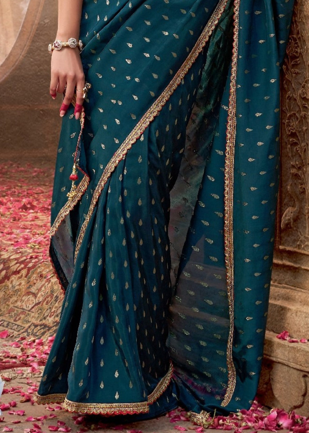 Teal Pure Viscous Crepe based fabric with Hand dying & Butti weaving Saree