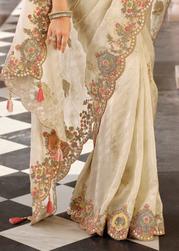 Pastel Cream with Peach-Pink floral border Silk Saree