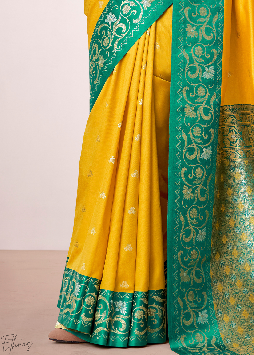 Saffron Yellow Paisley Border Satin Silk Saree