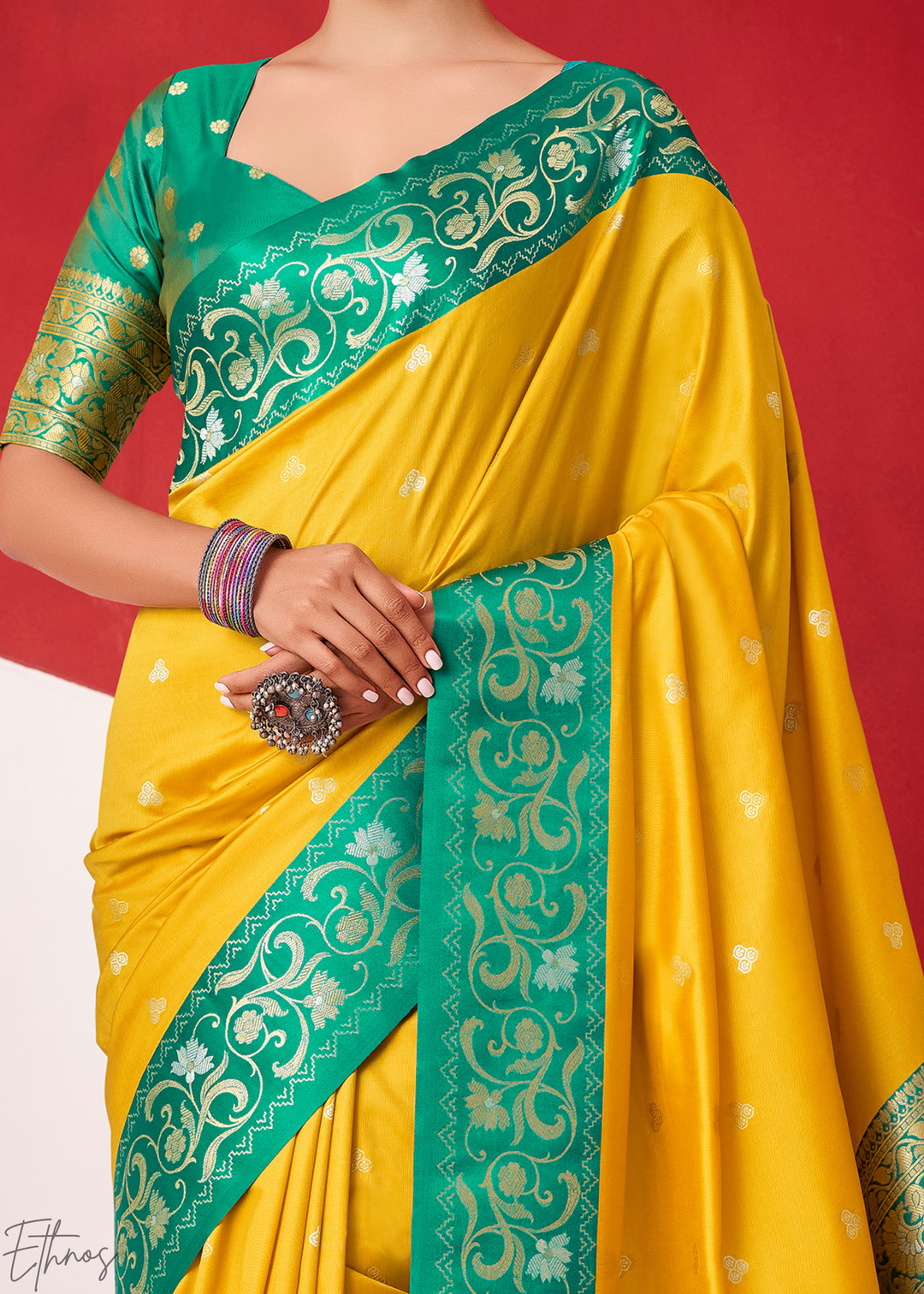 Saffron Yellow Paisley Border Satin Silk Saree