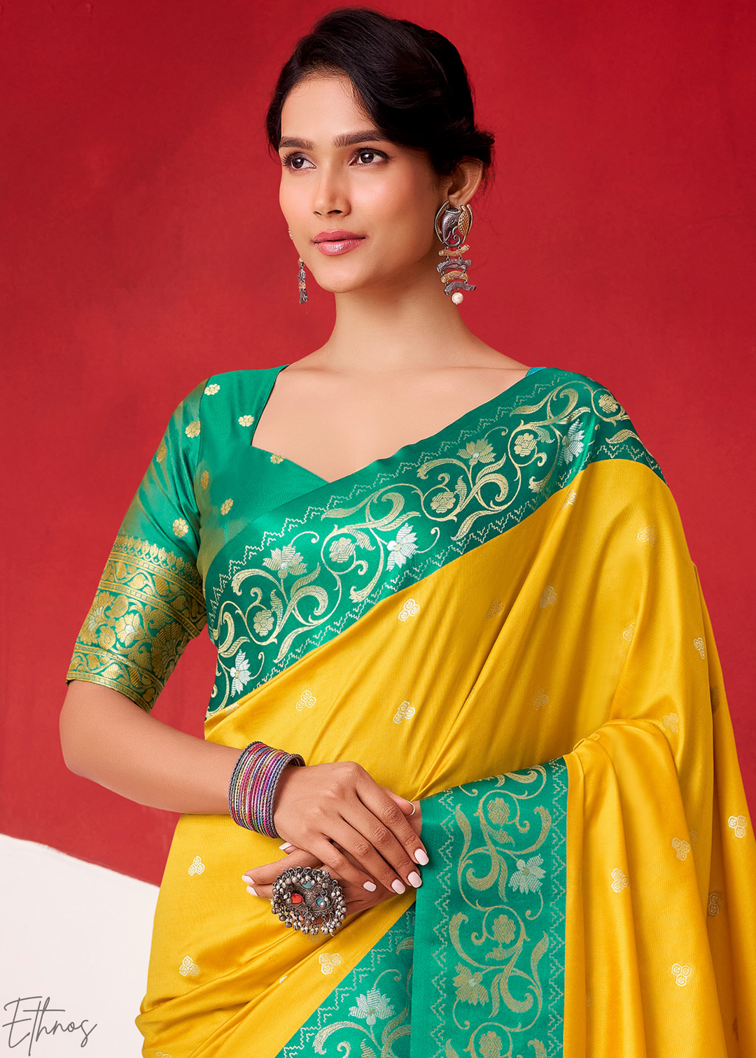 Saffron Yellow Paisley Border Satin Silk Saree