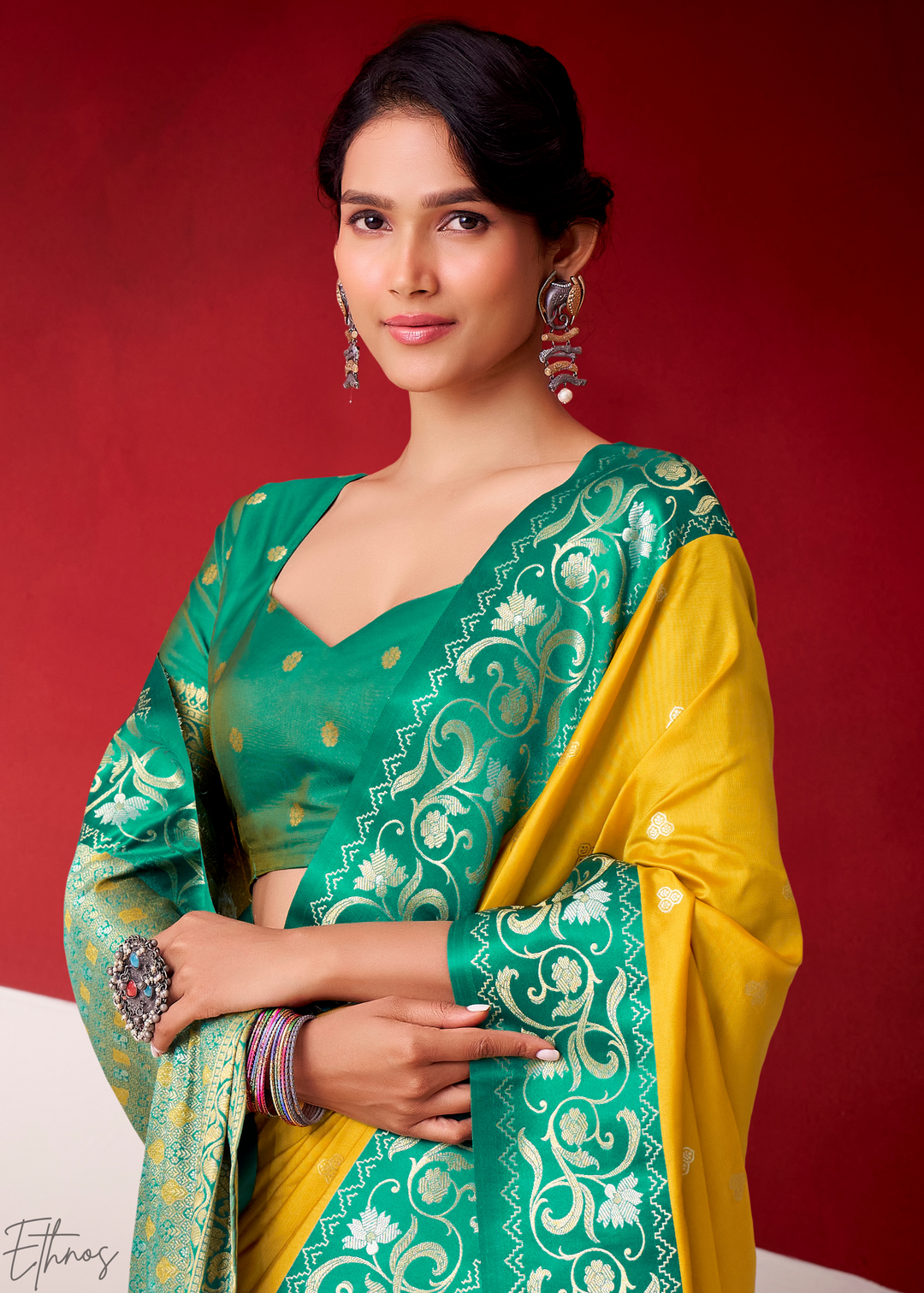 Saffron Yellow Paisley Border Satin Silk Saree