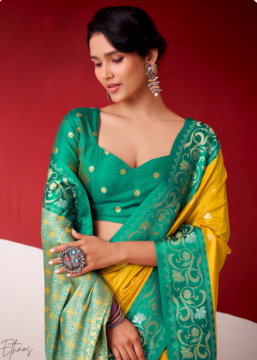 Saffron Yellow Paisley Border Satin Silk Saree