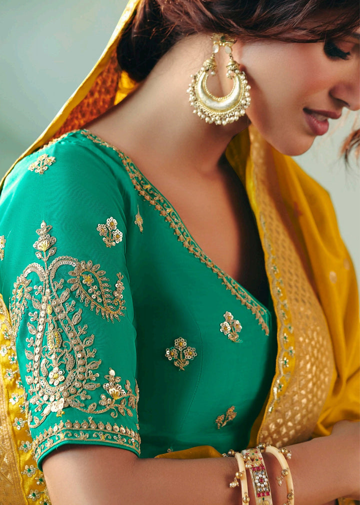 Golden Yellow Pure Viscose Dola Silk Saree with Zari Weaving & Embroidered Blouse