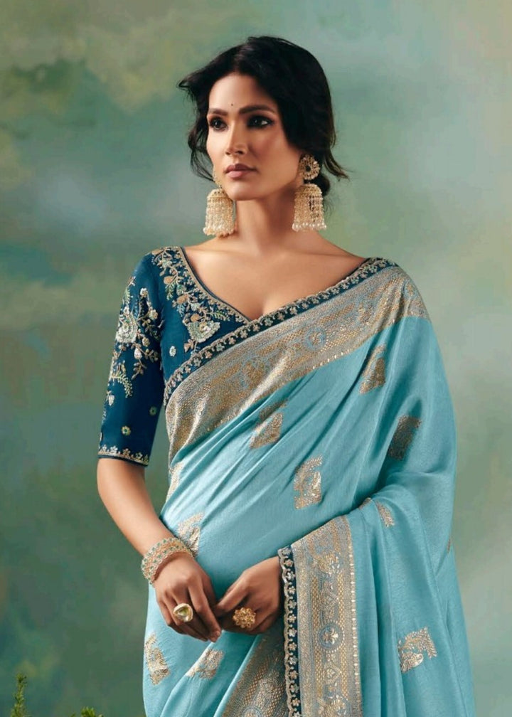 Sky Blue Pure Viscose Dola Silk Saree with Zari Weaving & Embroidered Blouse