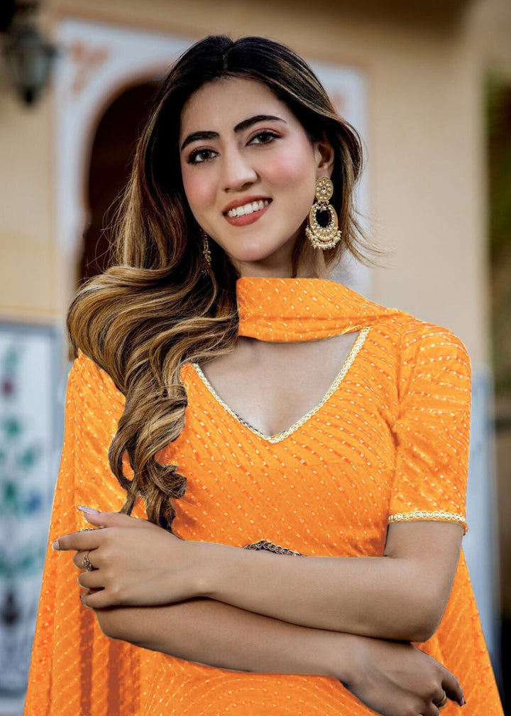 Tang Orange Georgette Leheriya Print Lehenga With Zari And Lace Work