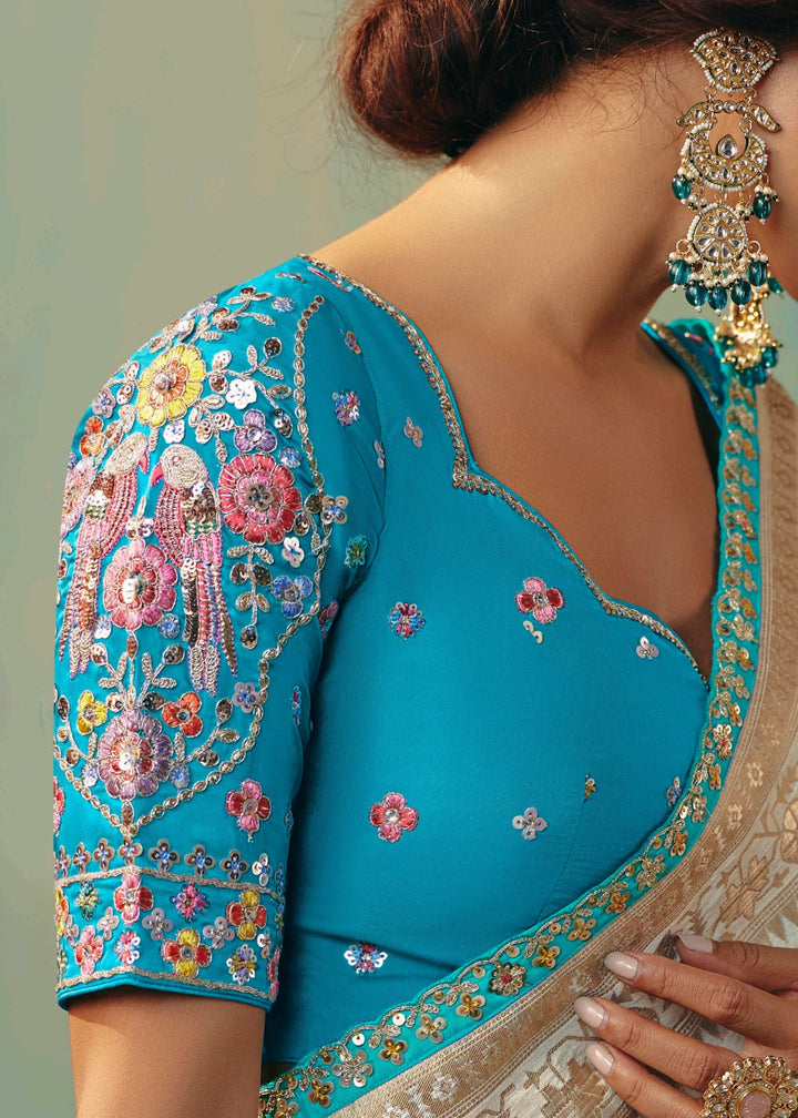 Off-White Pure Viscose Dola Silk Saree with Zari Weaving & Embroidered Blouse