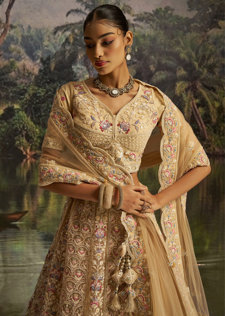 Cream Soft Net Lehenga With Multicolor Embroidery