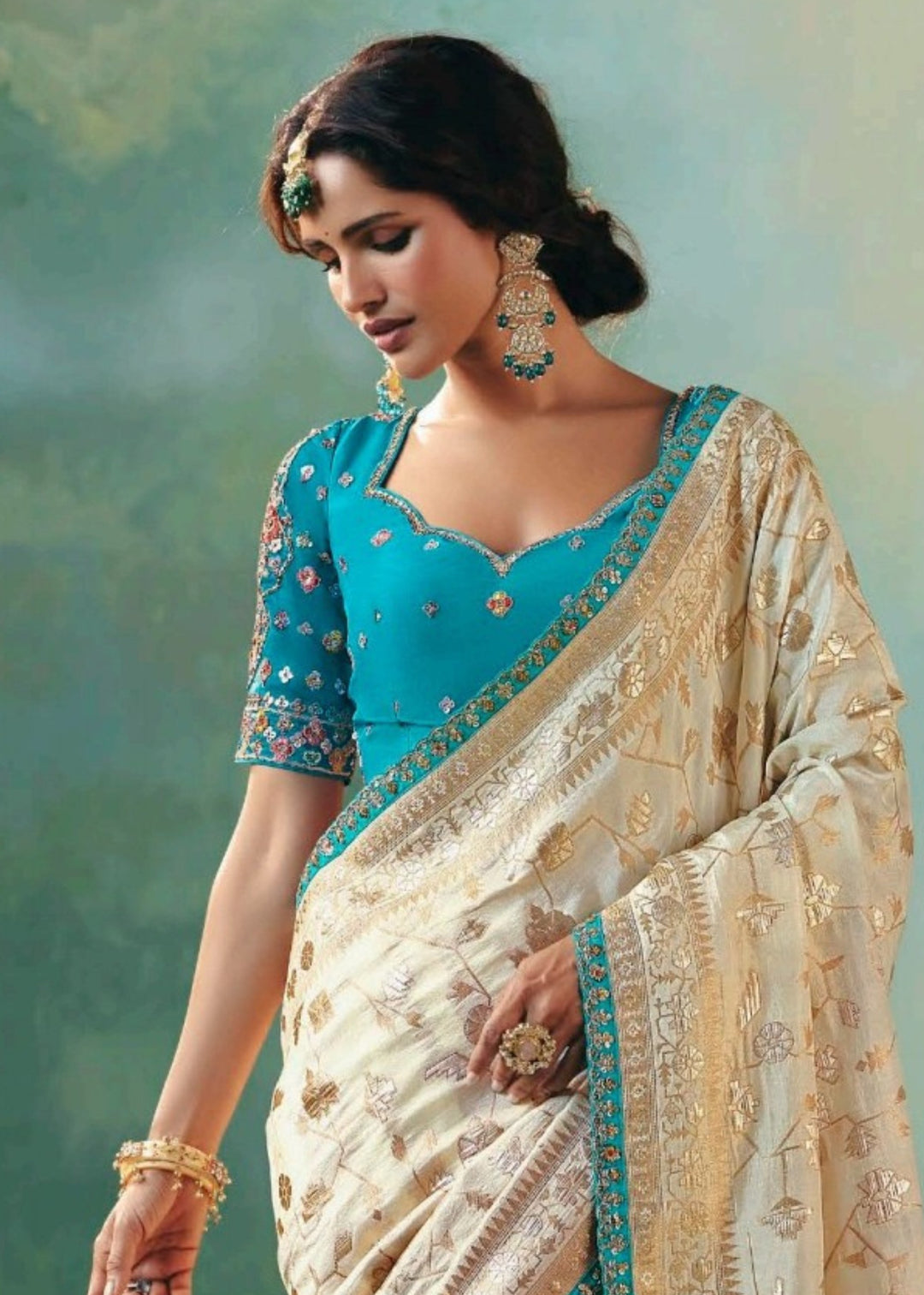 Off-White Pure Viscose Dola Silk Saree with Zari Weaving & Embroidered Blouse