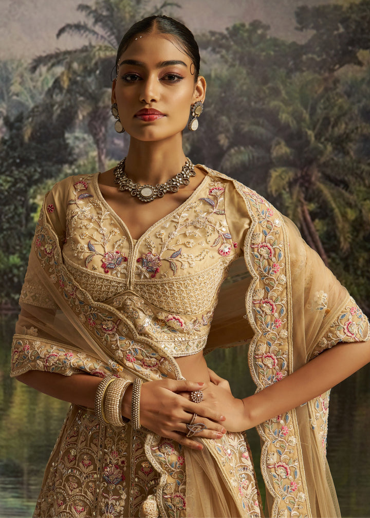Cream Soft Net Lehenga With Multicolor Embroidery