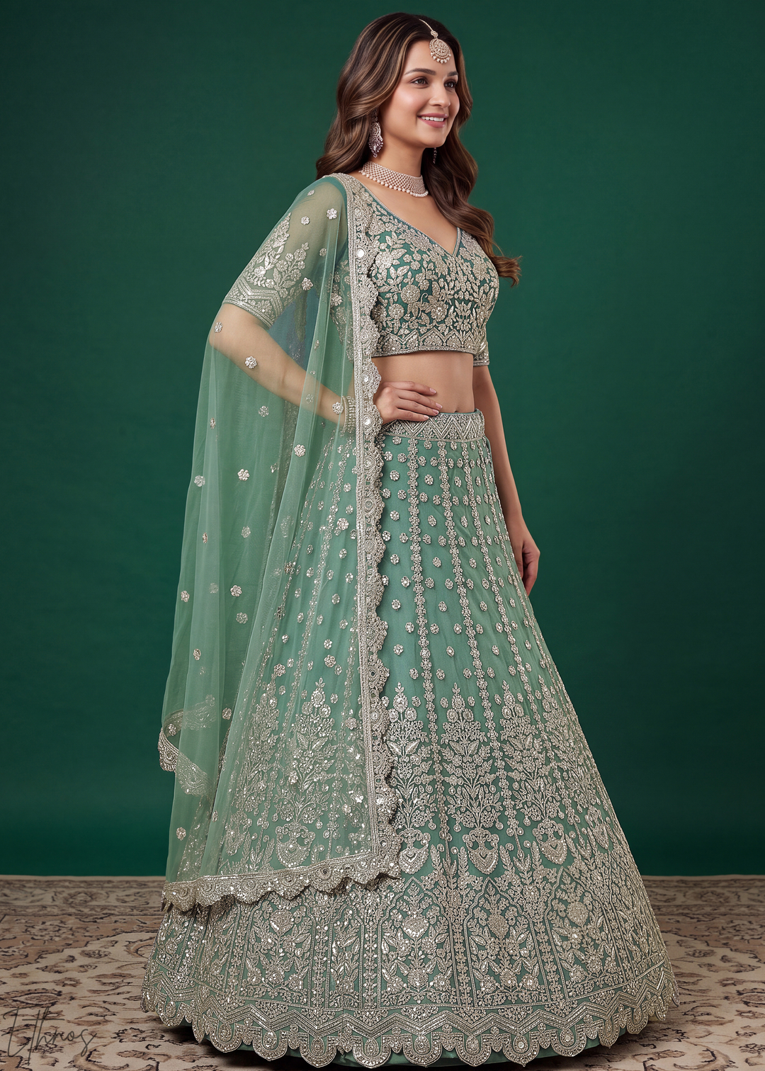 Pistachio Green Heavy Floral Embroidered Net Lehenga