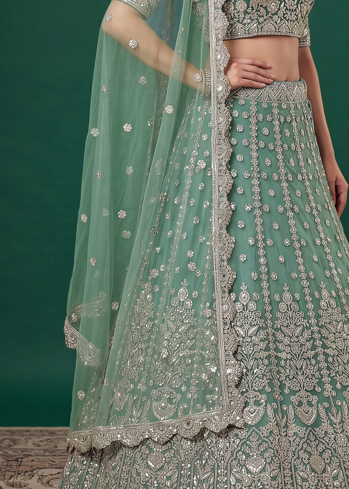 Pistachio Green Heavy Floral Embroidered Net Lehenga
