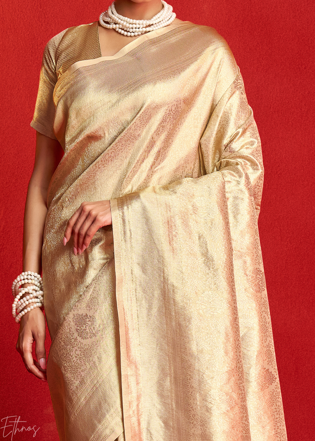 Champagne Gold Kanjeepuram Woven Zari Border Tissue Silk Saree