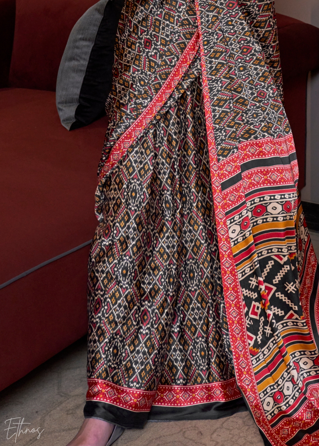 Coal Black Ethnic Patola Crepe Silk Saree