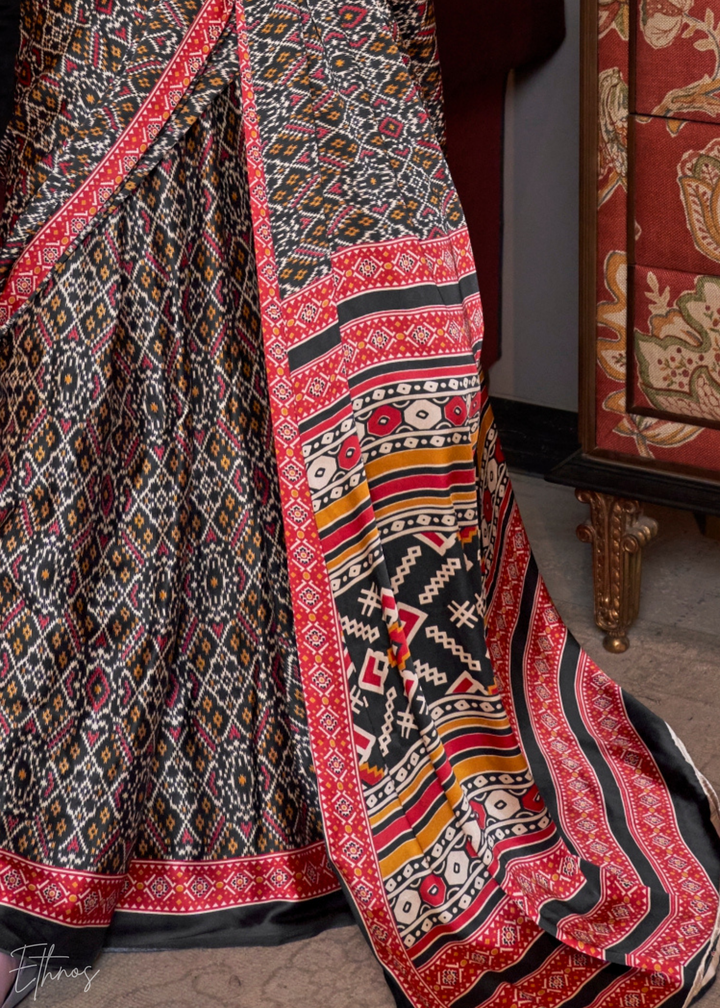 Coal Black Ethnic Patola Crepe Silk Saree