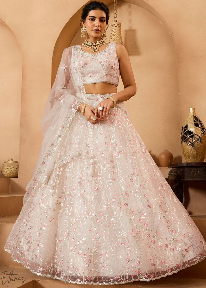 Cream Pink Pastel Floral Sequins Embroidered Net Lehenga Choli