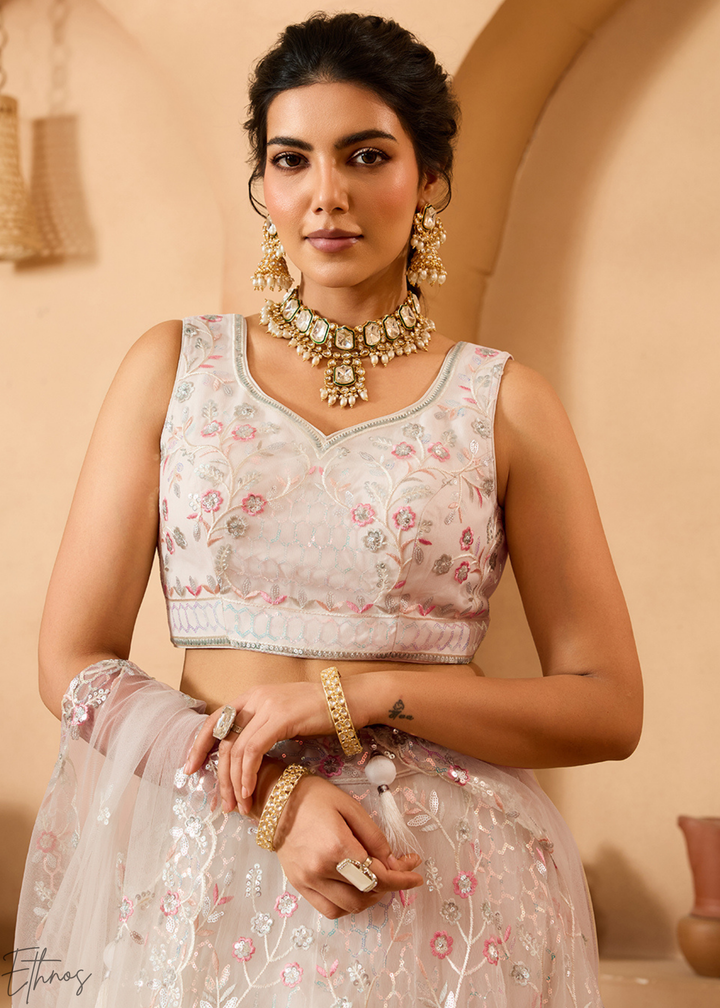 Cream Pink Pastel Floral Sequins Embroidered Net Lehenga Choli
