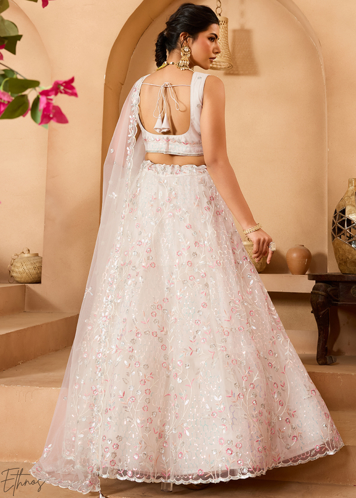 Cream Pink Pastel Floral Sequins Embroidered Net Lehenga Choli