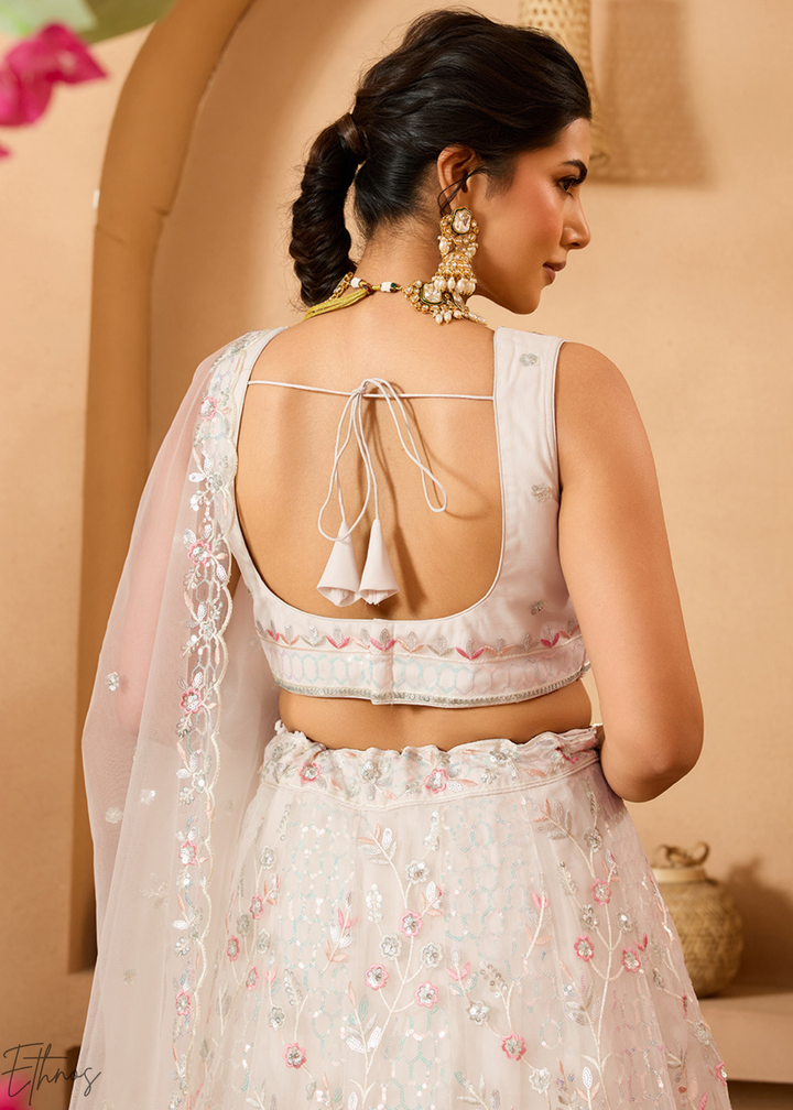 Cream Pink Pastel Floral Sequins Embroidered Net Lehenga Choli