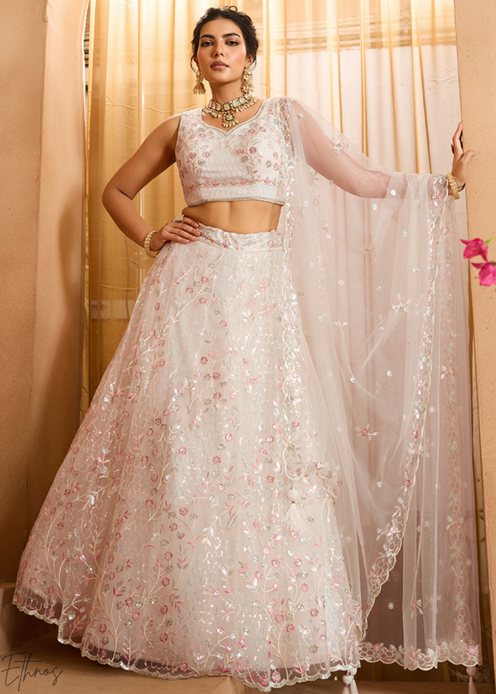 Cream Pink Pastel Floral Sequins Embroidered Net Lehenga Choli