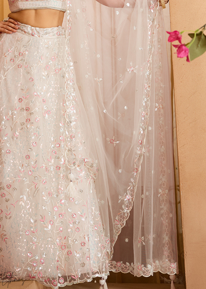 Cream Pink Pastel Floral Sequins Embroidered Net Lehenga Choli