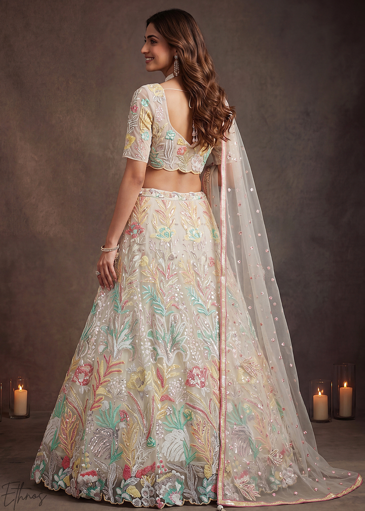Cream Radiant Blossom Soft Net Lehenga Choli