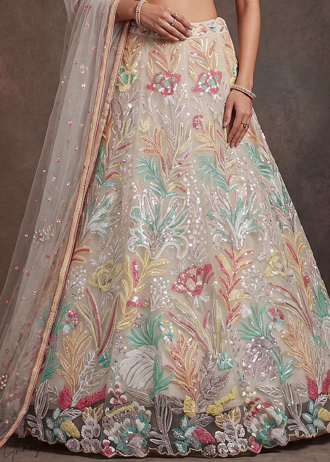 Cream Radiant Blossom Soft Net Lehenga Choli