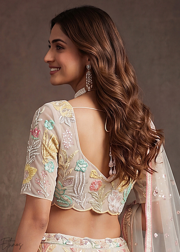 Cream Radiant Blossom Soft Net Lehenga Choli
