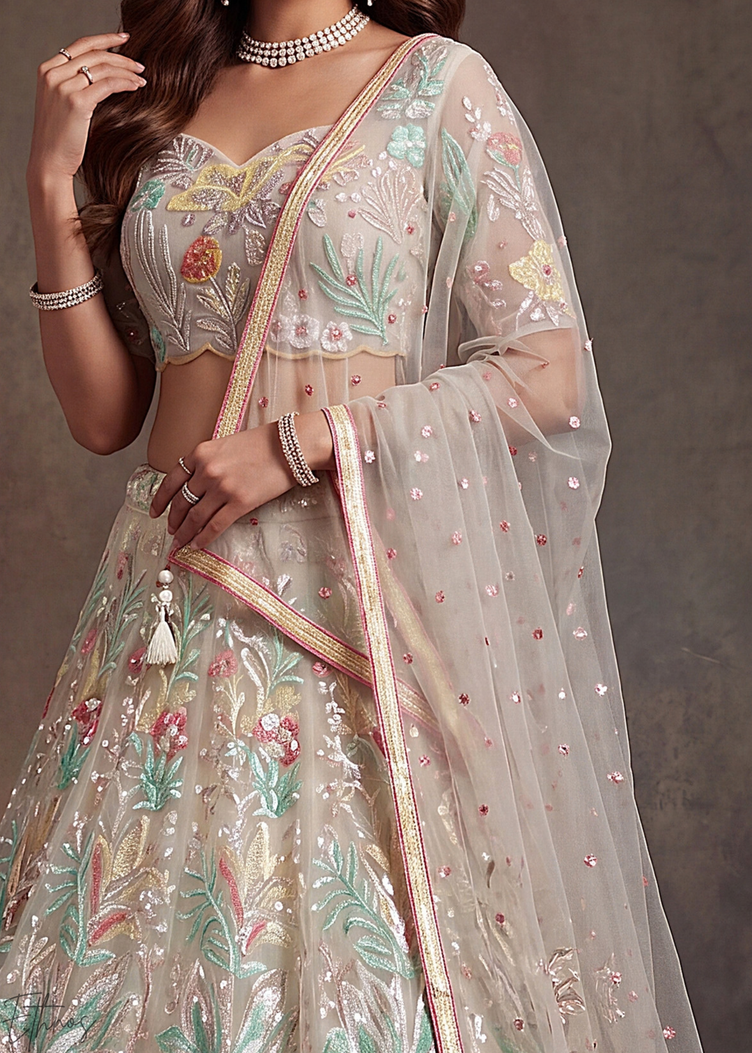 Cream Radiant Blossom Soft Net Lehenga Choli