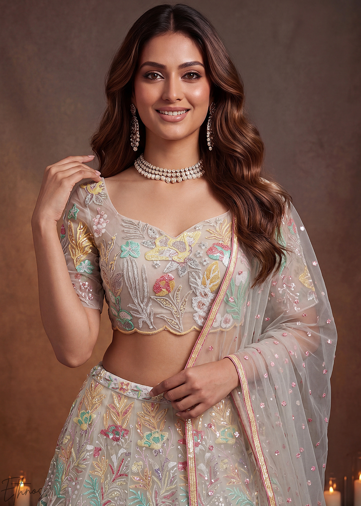 Cream Radiant Blossom Soft Net Lehenga Choli