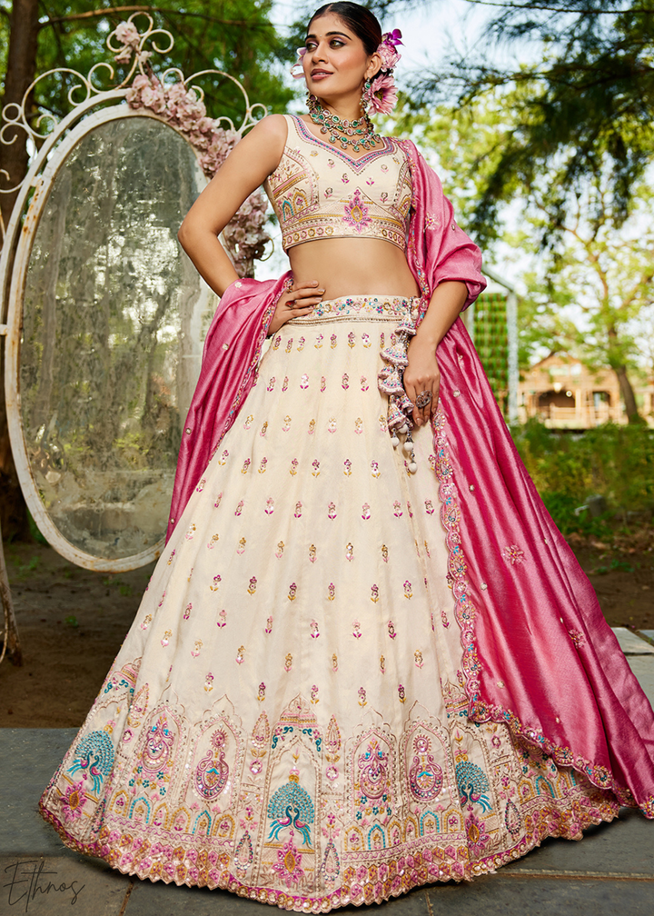 Cream and Pink Peacock Embroidered Tissue Lehenga Choli