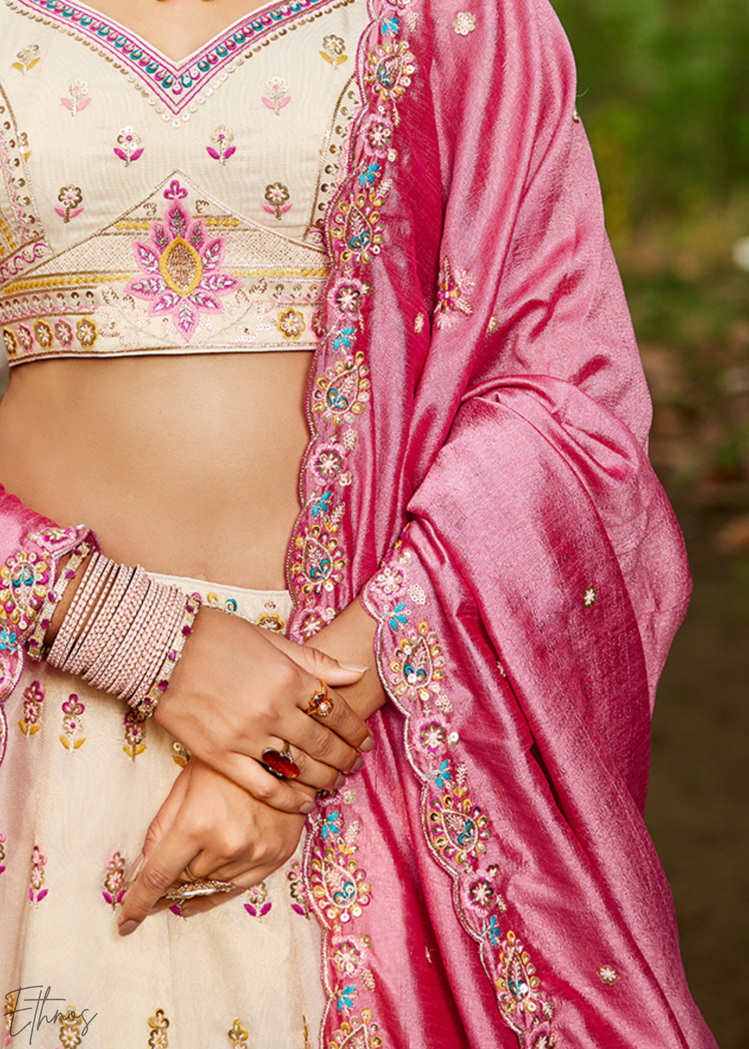 Cream and Pink Peacock Embroidered Tissue Lehenga Choli