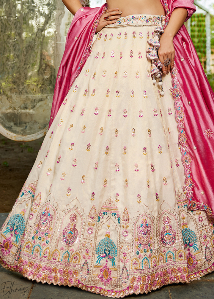 Cream and Pink Peacock Embroidered Tissue Lehenga Choli